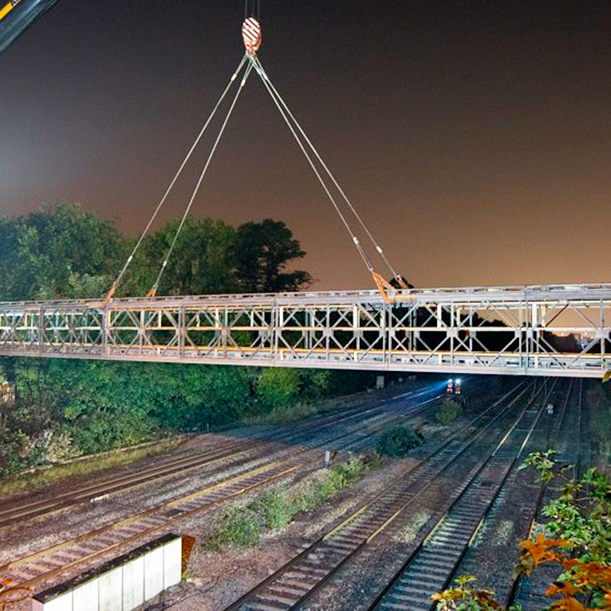MH International MU bridge being lifted over railway line