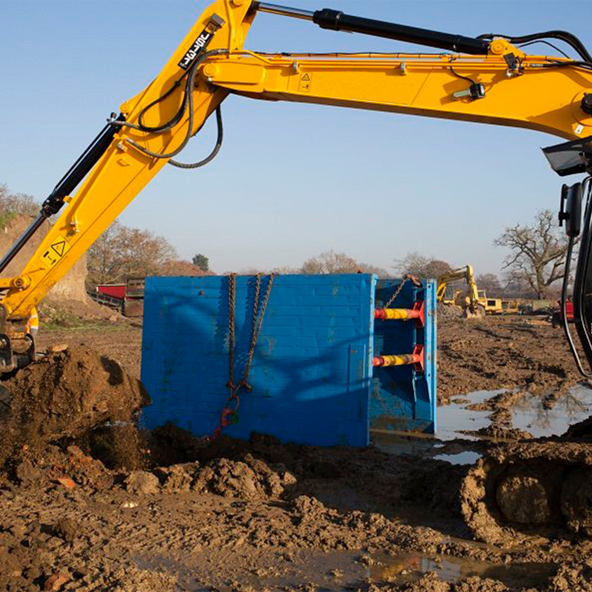 MH International trench box on site with digger